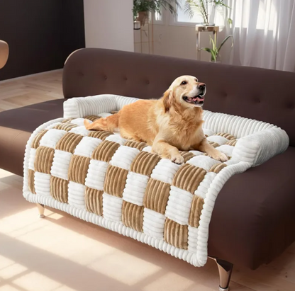 Small dog resting inside cozy plush pet bed