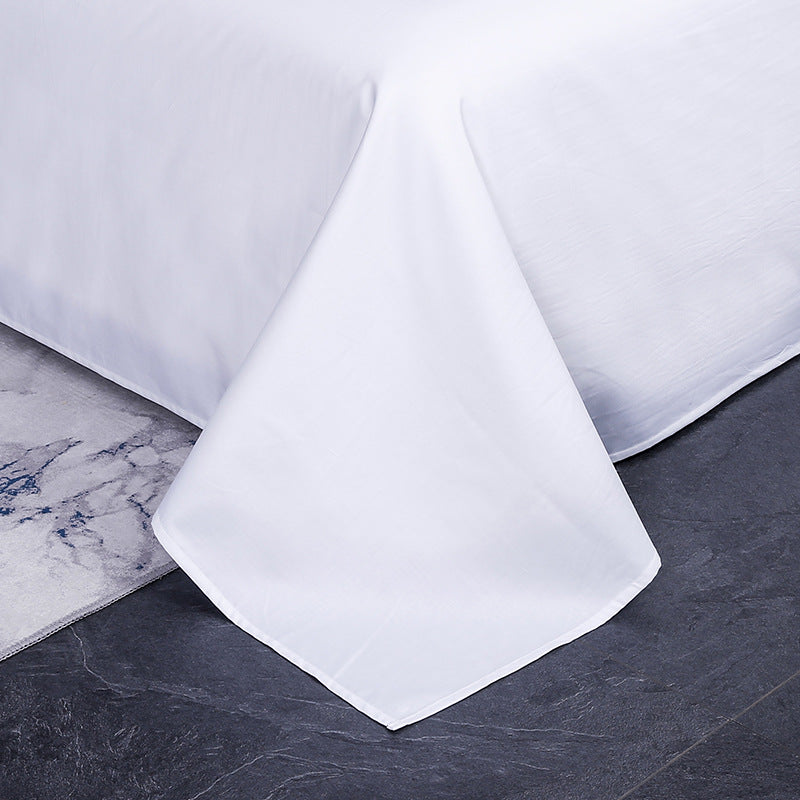 Luxury hotel white bedding close-up pillow texture